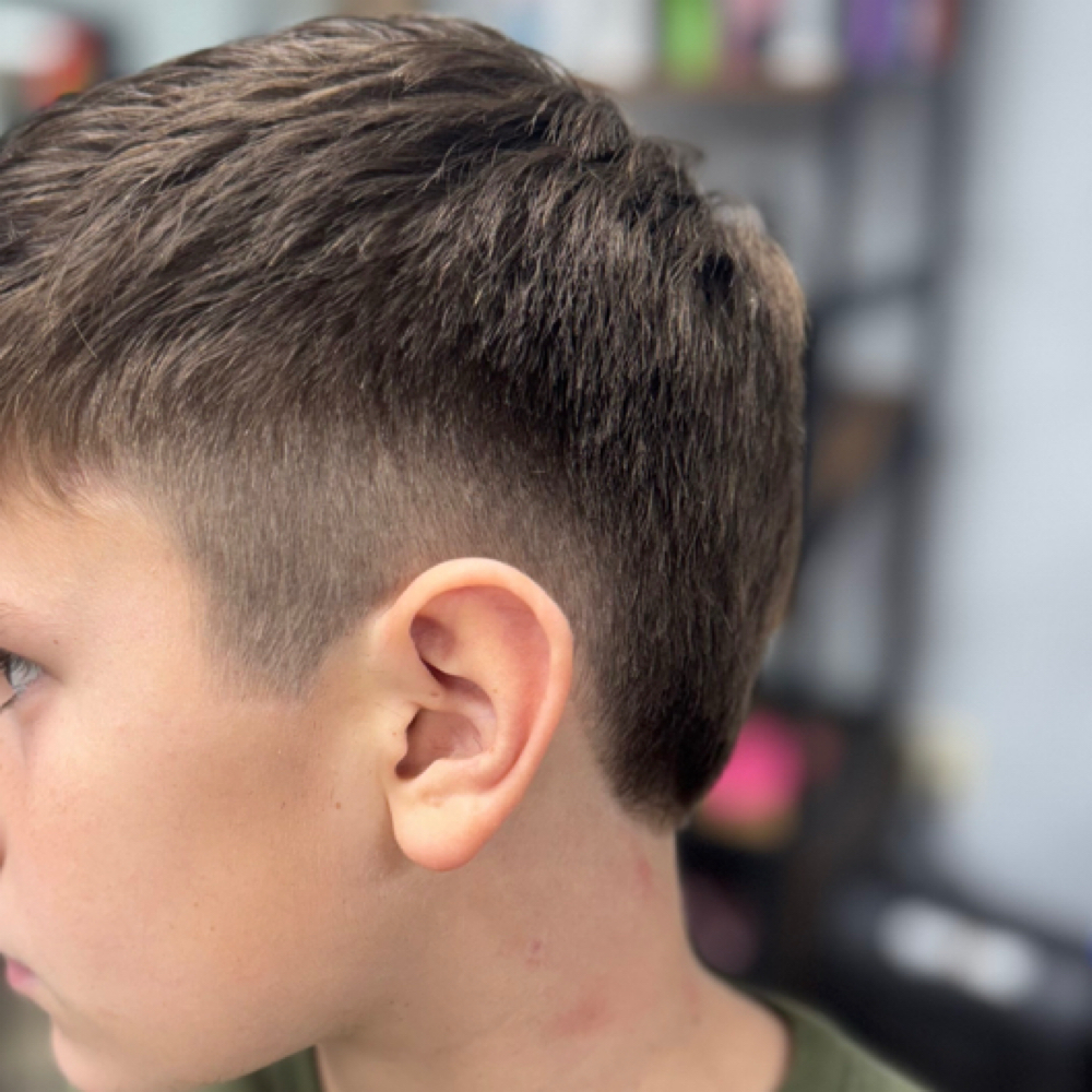 Kids Cut 12 and Under at 932 Beauty Bar in Albia, IA
