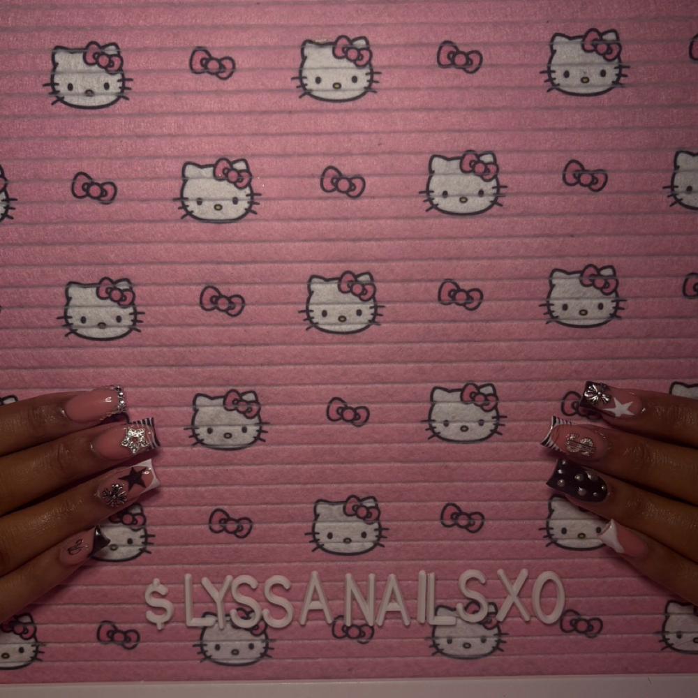Short acrylic( bedazzling 1-2) at Lyssanailsxo in Perth Amboy, NJ