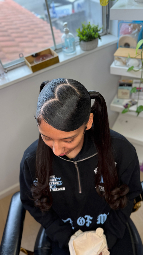 Two Sleek ponytails
