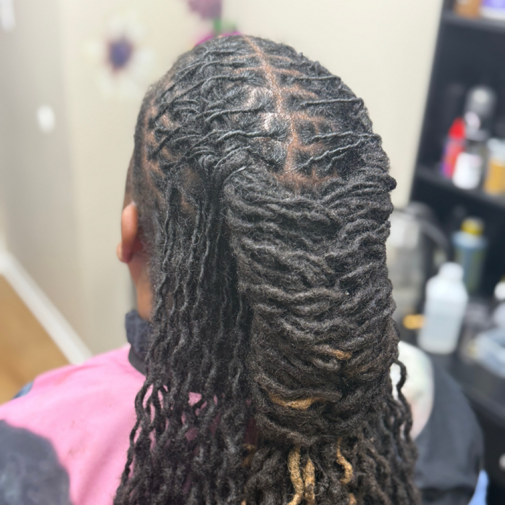 Style Between Retwists at Locd by Nneka in Joliet, IL