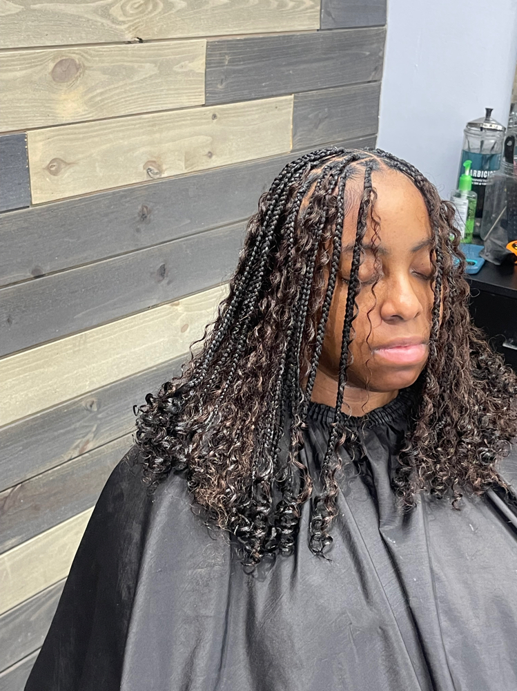 Small Shoulder/ Bob Knot at TheHairAllure in Indianapolis, IN