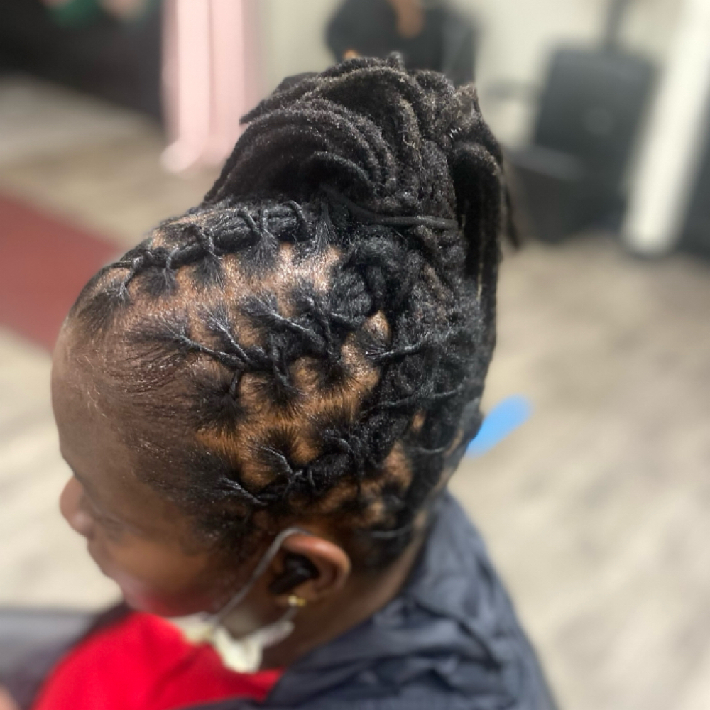 Locs Retwist - Mid Back at Crowned Braids Salon in Conway, SC