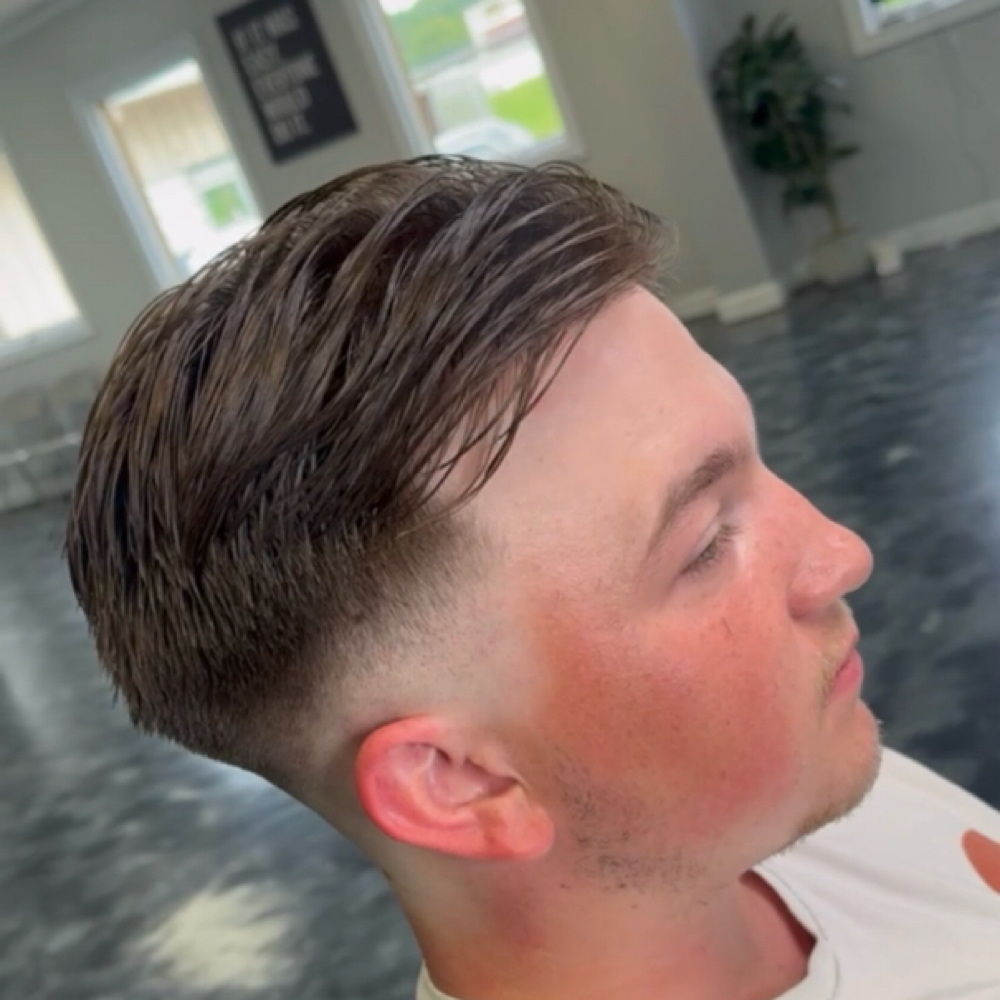 Shampoo & Haircut at Corte Fuerte Barbershop in Muscatine, IA