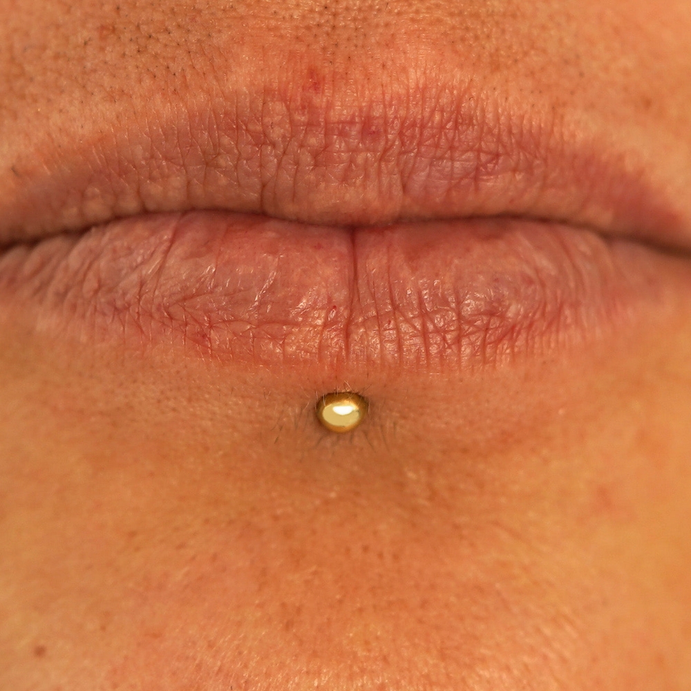 Labret *piercing*