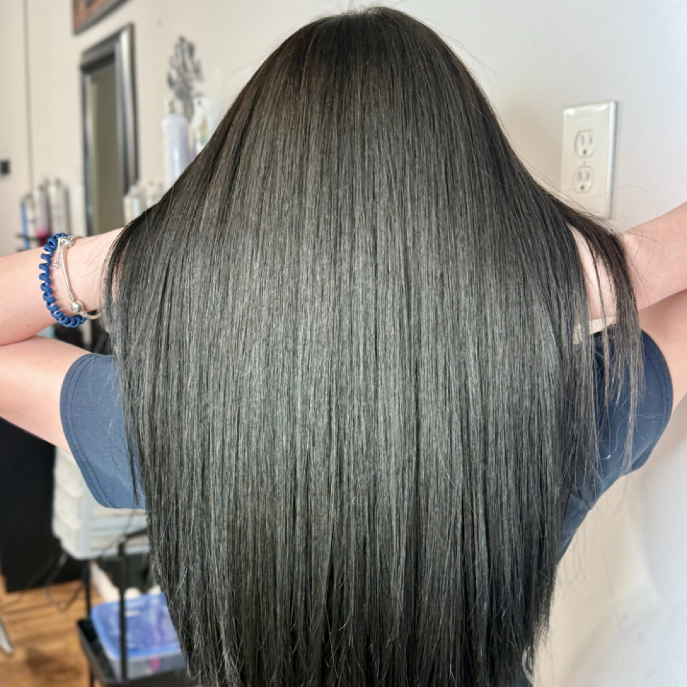 Straightening hair treatment at Dollhouse Collective in Jasper, AL