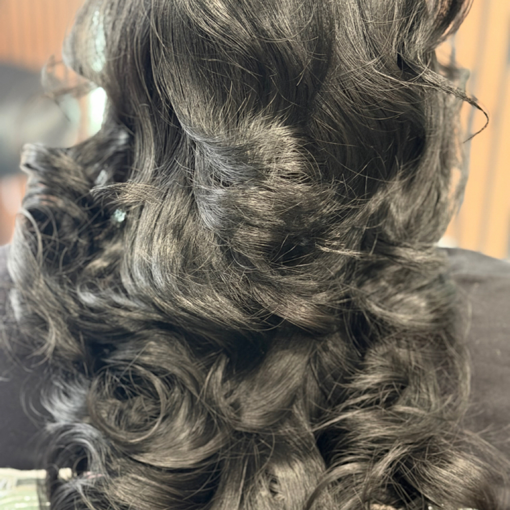 Signature Layer Cut at At Christina's Hair & Beauty Studio in Bronx, NY