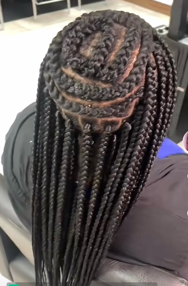 Box Braid Bun at Lavoyce’s 2.0 Luxury Hair in Bastrop, TX