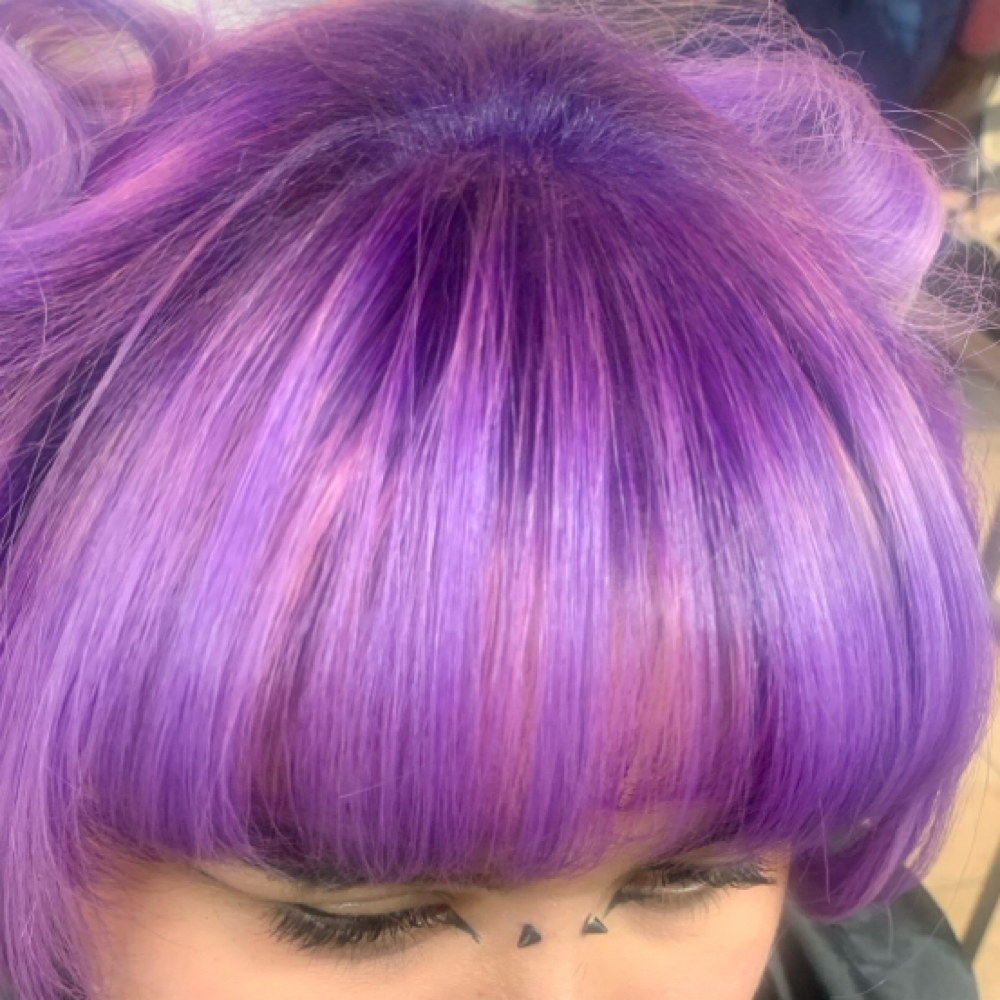 Hair Fringe Trim at Giselles hairstyle corp. in Bronx, NY