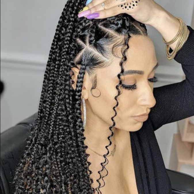 Boho braids (L) at FinessedBeautybar in Evans Mills, NY