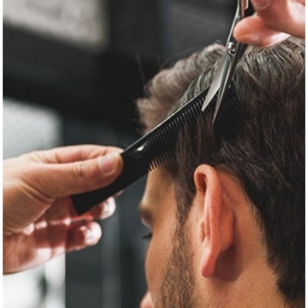 Men's Haircut at Couture hair and day spa in Rock Falls, IL