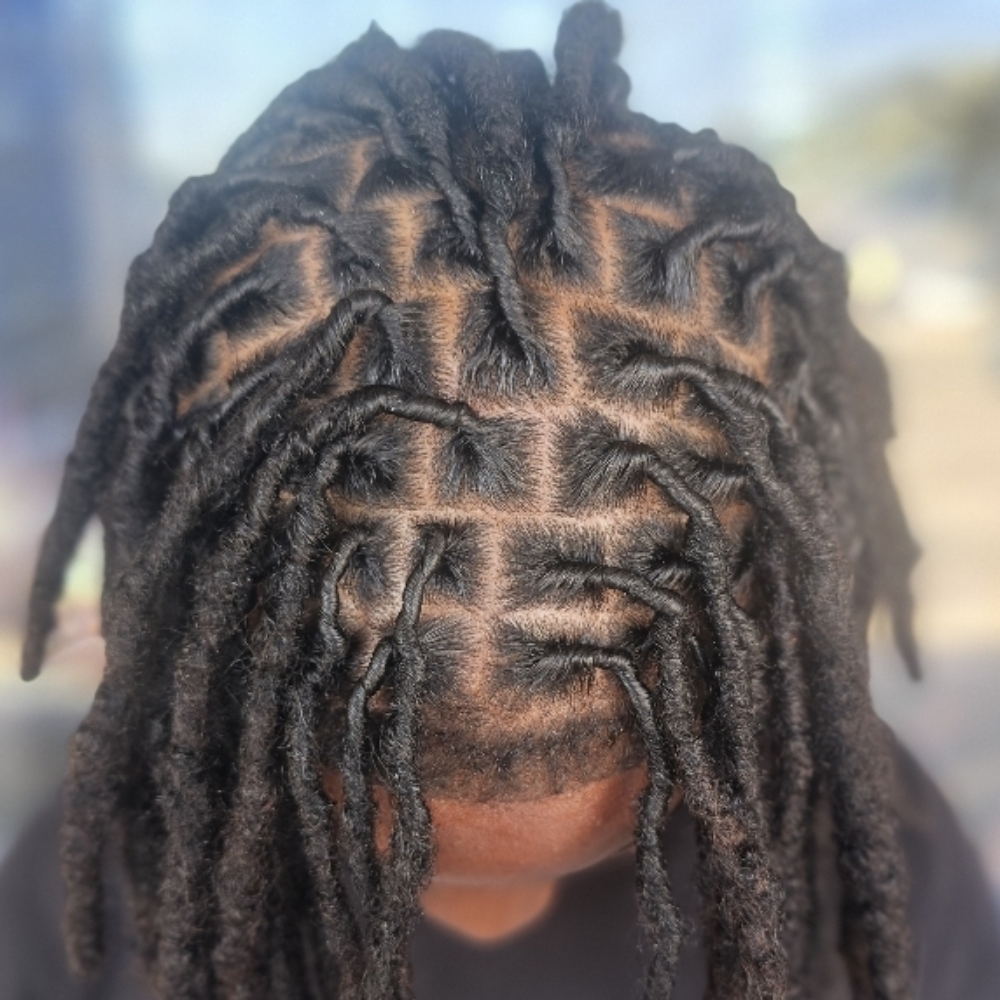 Loc Re-twist at Ruutz By Kreol in Killeen, TX