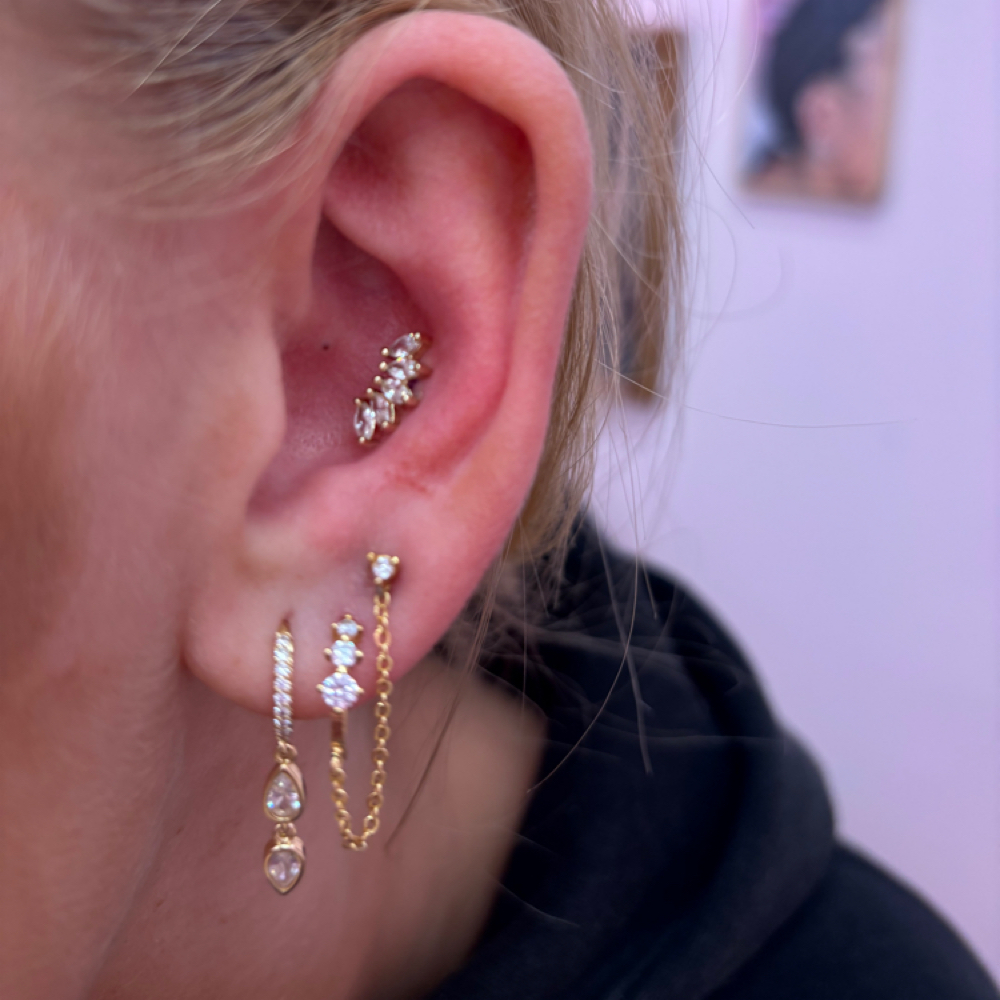 Ear Bath at Riot Permanent Jewelry in Brownsburg, IN