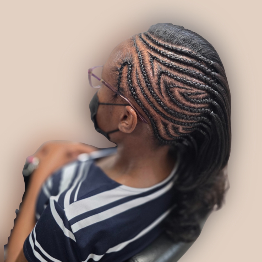Partial Sew In with Braid Designs at Touch of Heaven Artistry in Humble, TX
