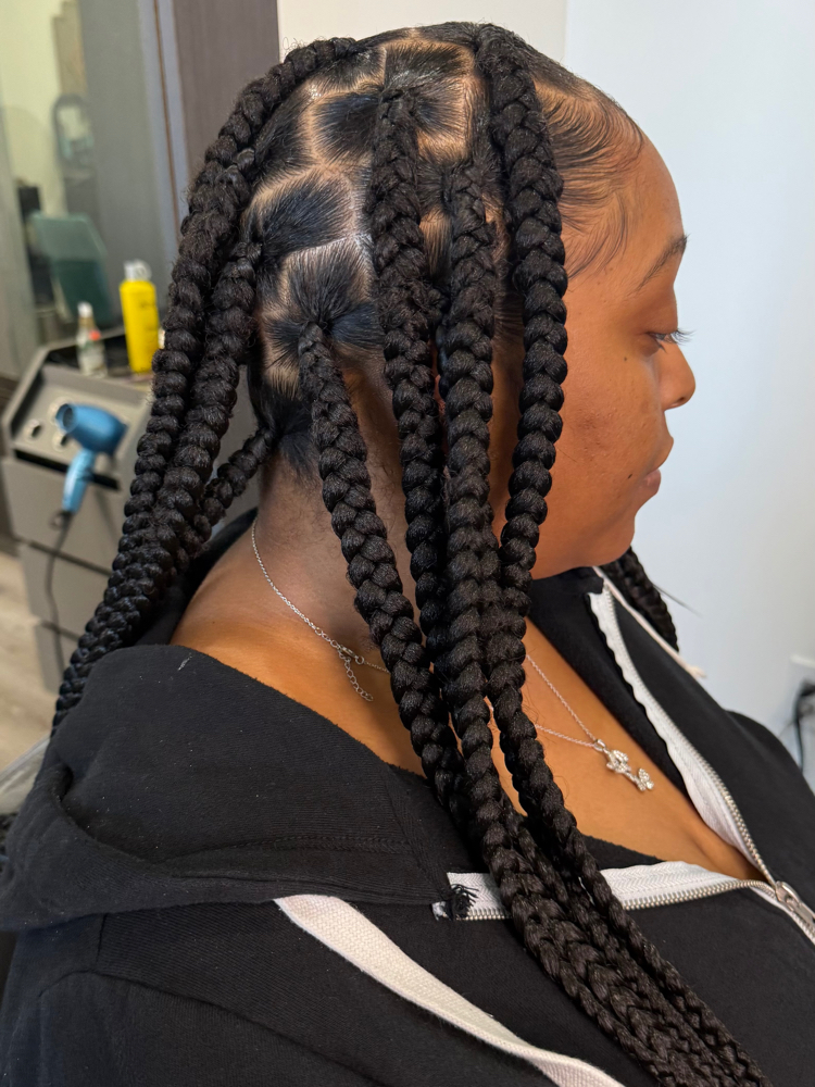 Braids over Locs at Manou Locs & Braids in Atlanta, GA