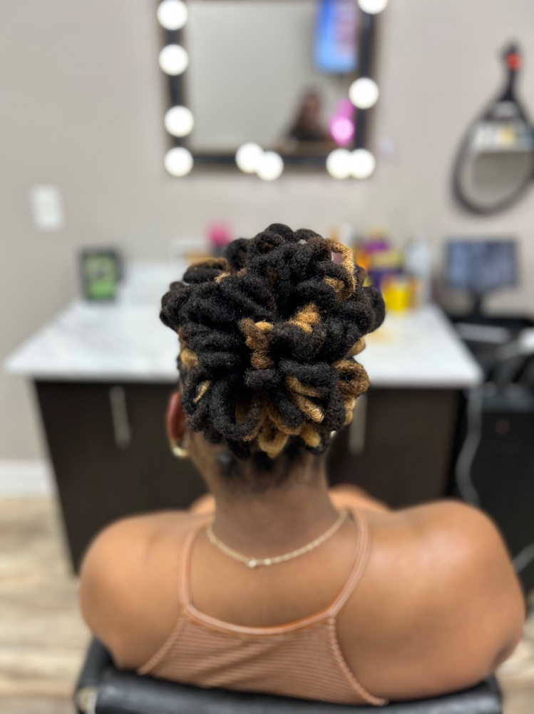 Loc Retwist & Petal Style at Ja’Tae Style Studio LLC in Euclid, OH
