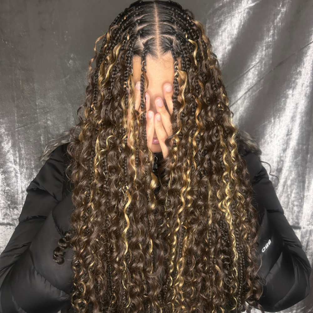 Boho Knotless Braids at Tyra’s Braids & Co. in Kenosha, WI