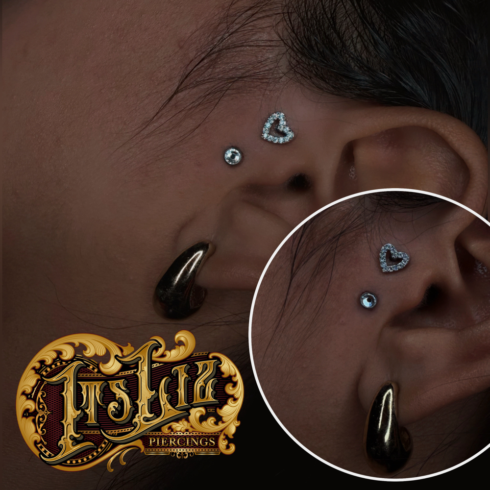 Surface Tragus With Heart Top at Itslizpiercings in Houston, TX