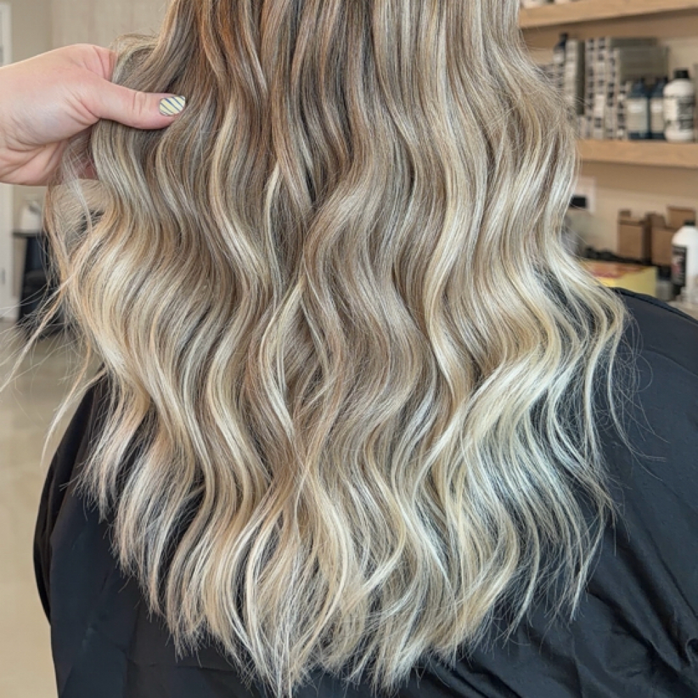 The Alzar Signature Luxury Blonding at Alzar Salon in Willoughby, OH