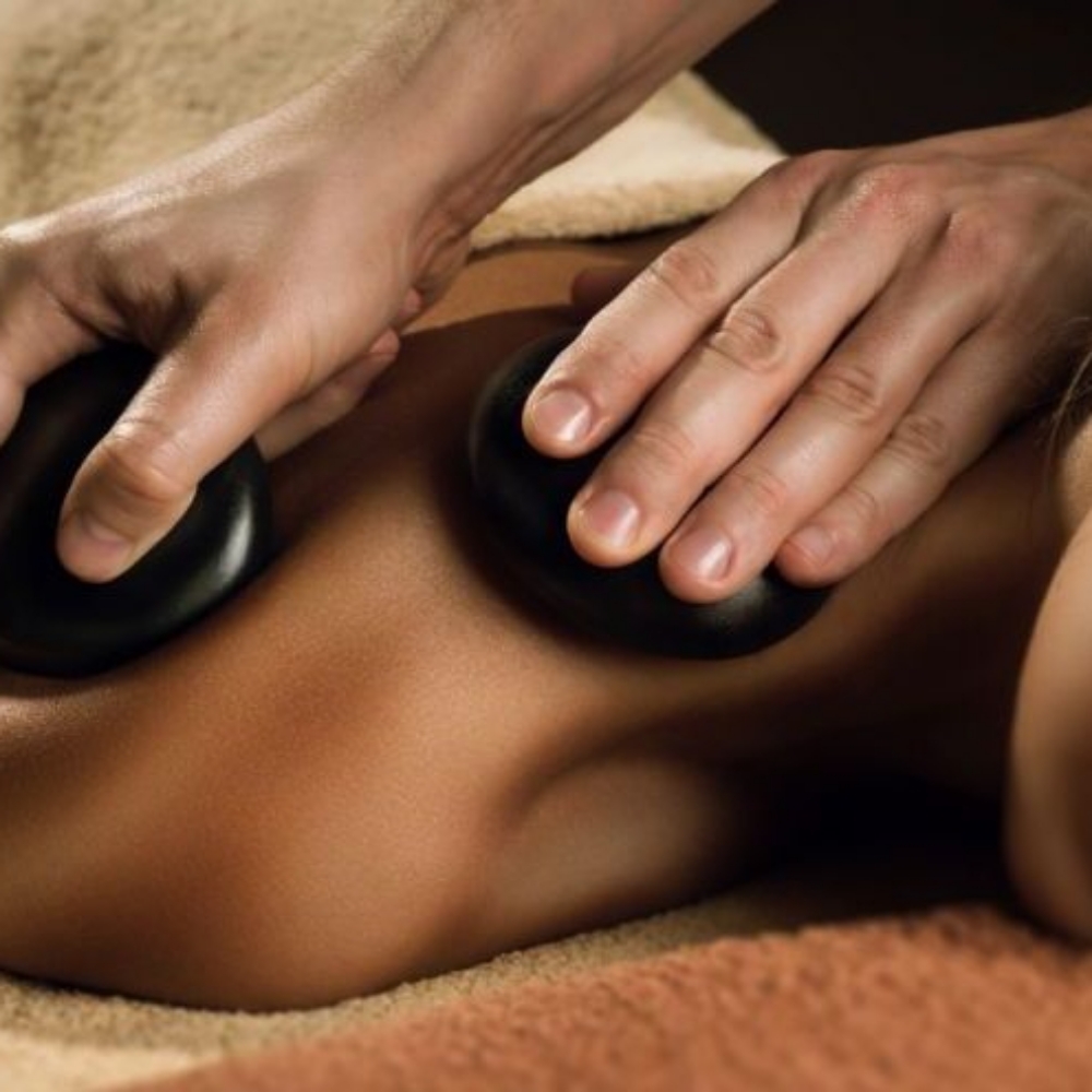 Warm Oil Hot Stone Back Massage at Serenity & Rose Salon and Spa LLC in Dayton, OH