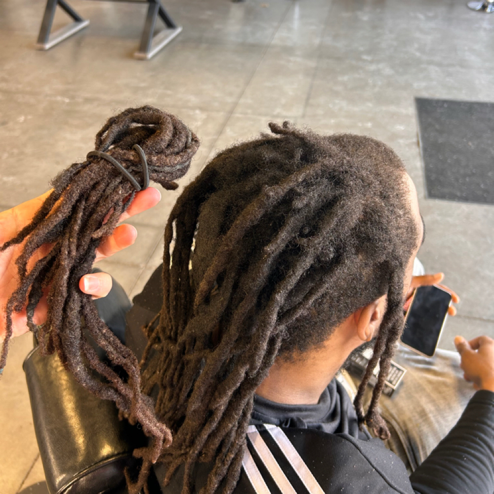 Dreadlock Reattachment at KenzKuts in Eau Claire, WI