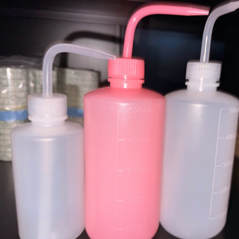 Pink Or White Tattoo Bottles at The crown ink studio in Corpus Christi, TX
