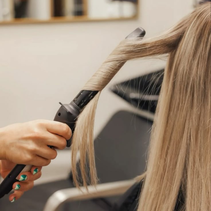 Curling or Flat Iron Style at Hair by Victoria in Knoxville, TN