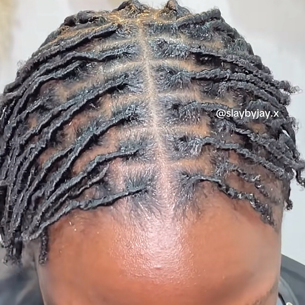 Starter Locs With Comb Method at Afrokreyol braiding salon in Plantation, FL
