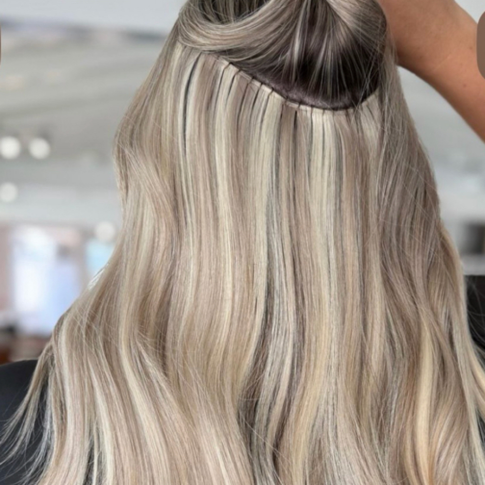 One Row Sew In Extension Move Up- at The Butterfly Loft in Fenton, MI