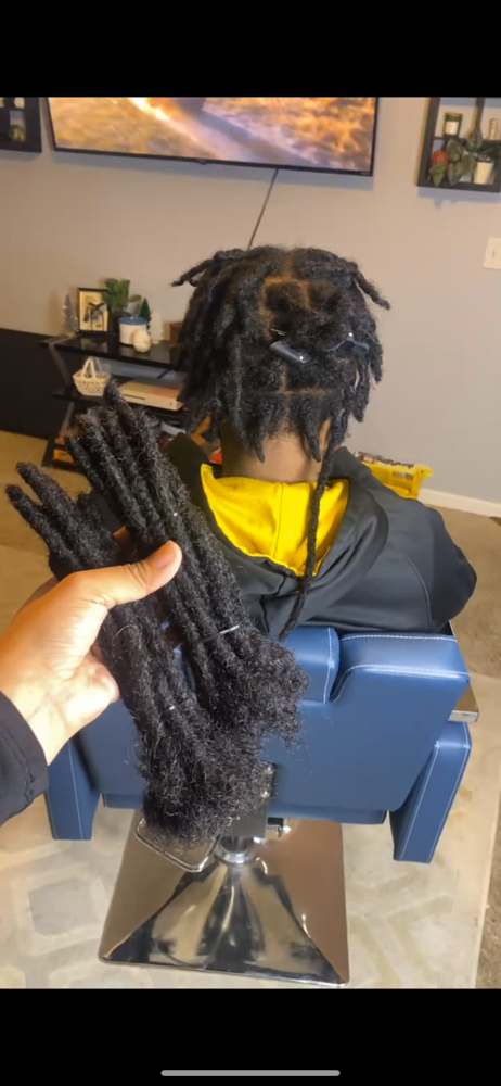 Loc extensions / Loc Re-Attachment at Estrebeautyy in Columbia, MO