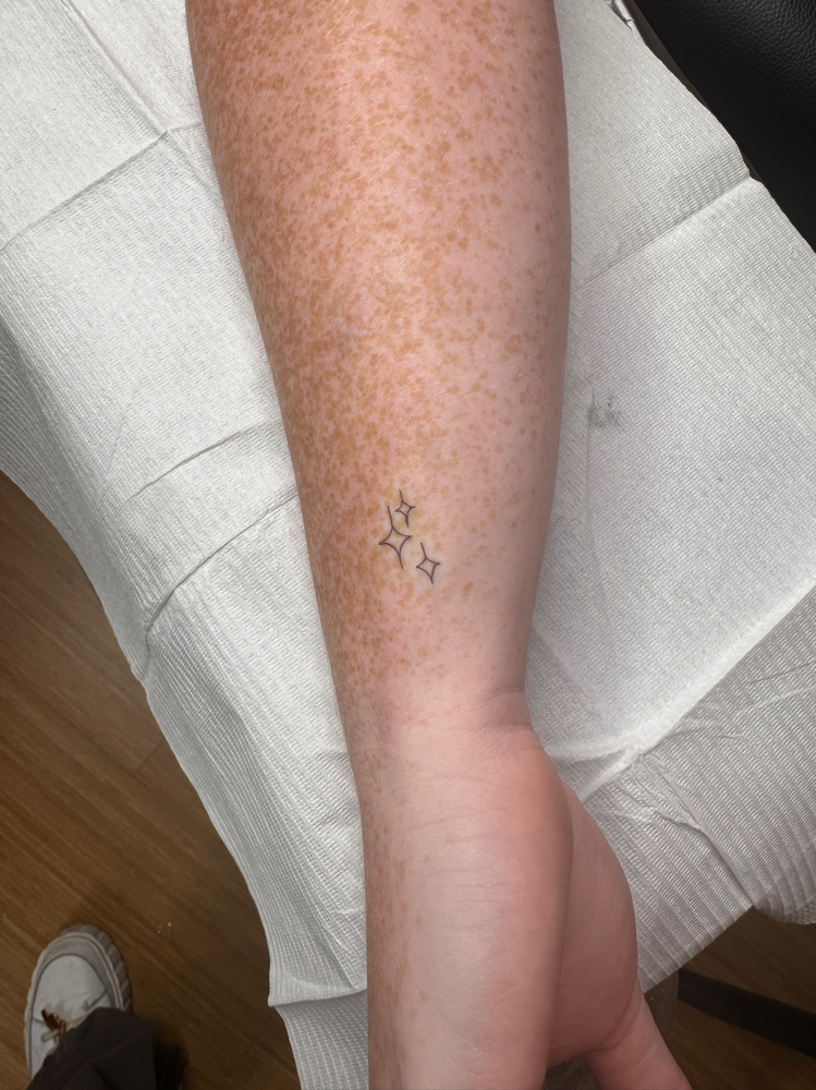 Fine Line Tattoo