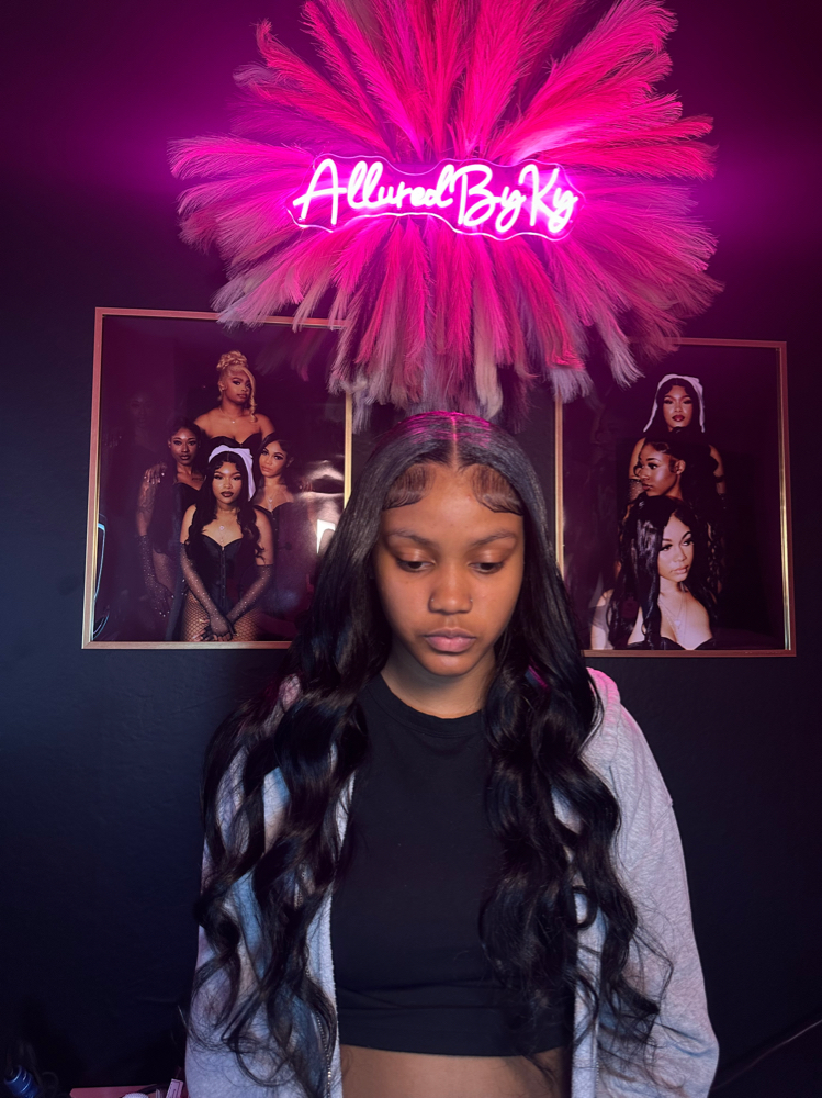 middle part quick weave at alluredbyky in laveen, AZ
