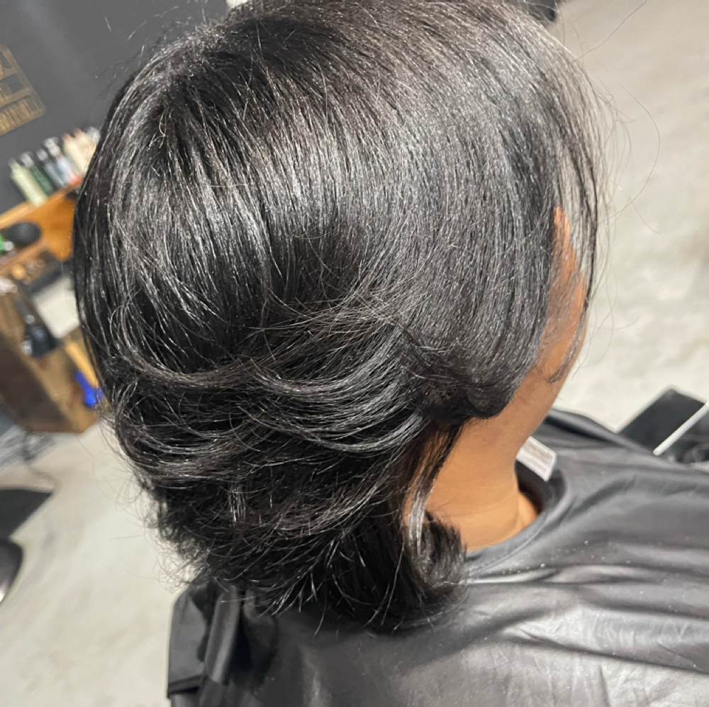 Shampoo + Style at J. Mc Hair Studio in Hattiesburg, MS