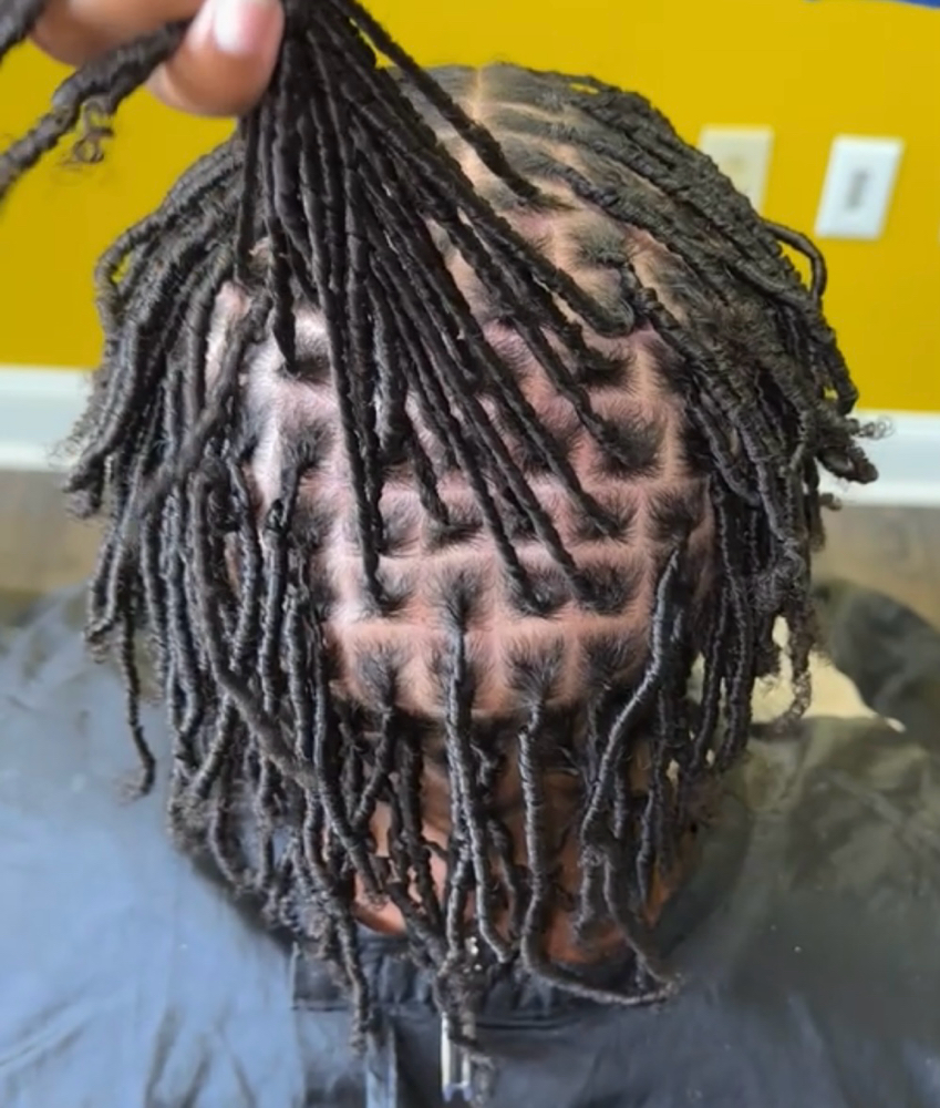 Coil Starter Locs at Loc’d In With Dej in Fayetteville, NC