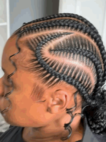 Design Stitched Low Bun at Braided by Christy in Hattiesburg, MS