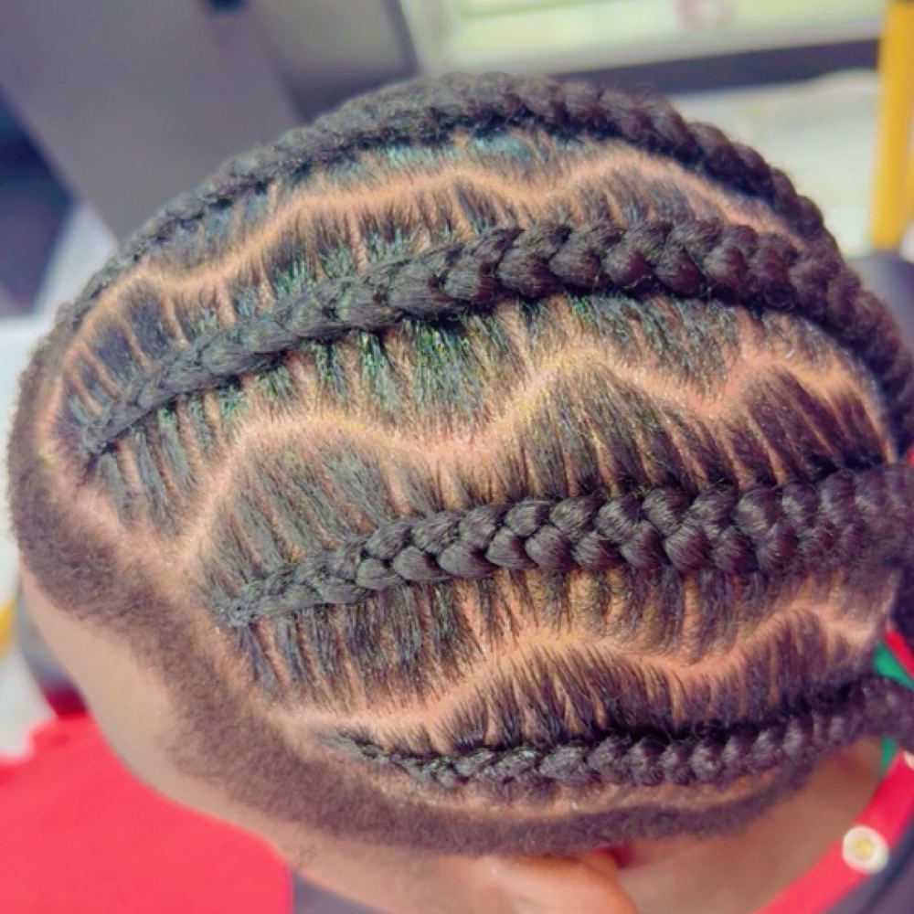 Conrconws Men at Reyes Styles Barbershop & Salon in Salisbury, MD