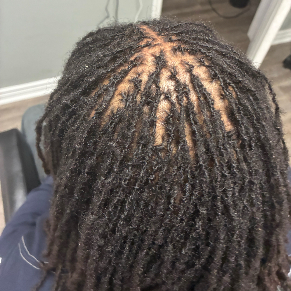 Sister locs at Studio Eman LLC by Paige Eman in Roseville, MI