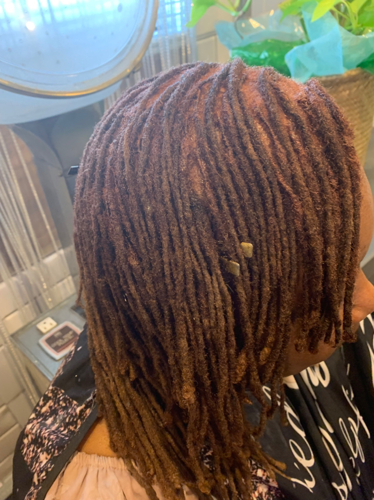 Loc’ Retwist  W/ Treatmen