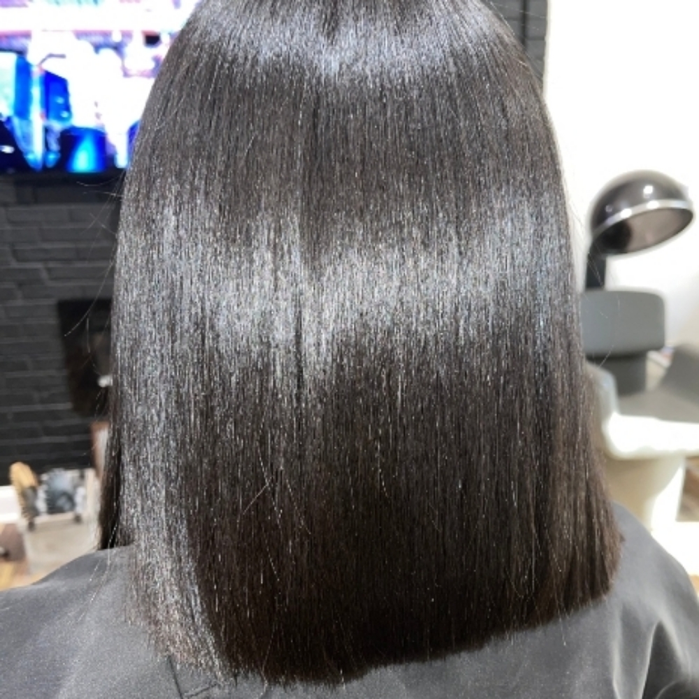 Relaxer Touchup + Steam + Style at Hair by Dawn Katera in Temple Hills, MD