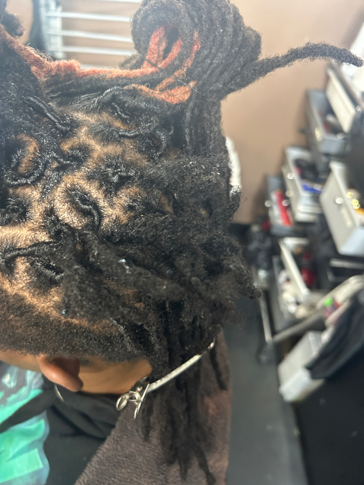 Loc Repair at Crowned By Qunda in Columbia, SC
