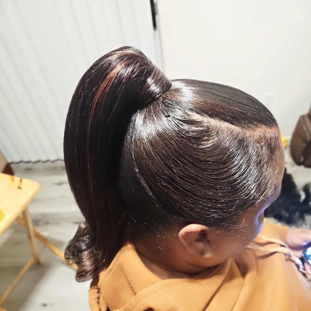 Sleek ponytail at Styles By Carrera in Las Vegas, NV