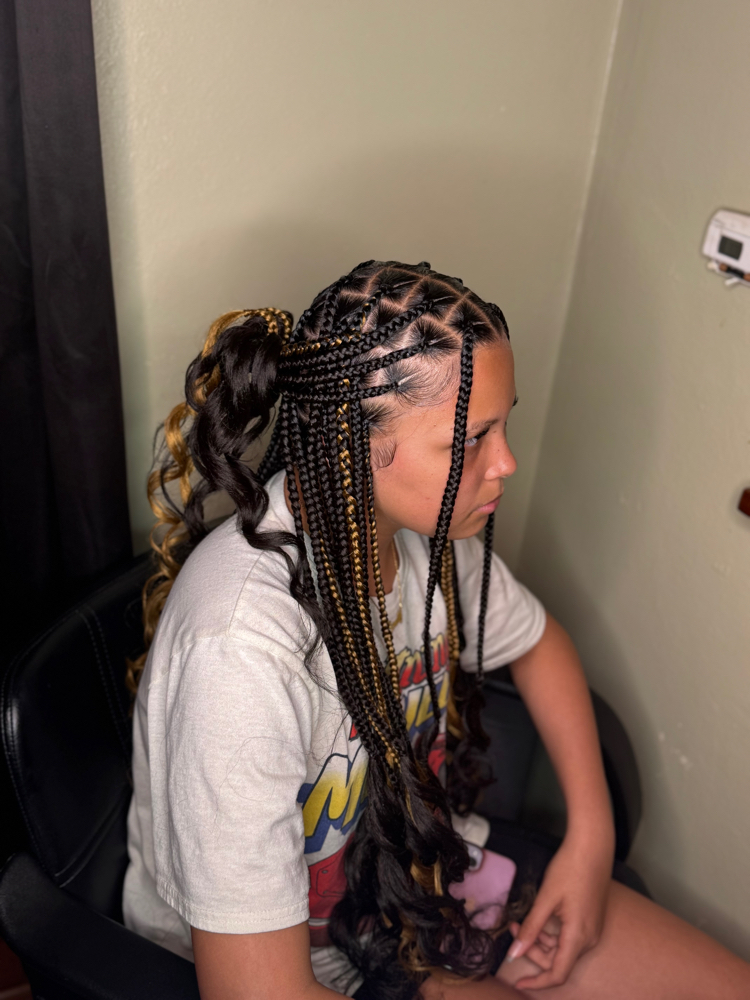 Medium Knotless French Curl at Hair Cartel in South Bend, IN