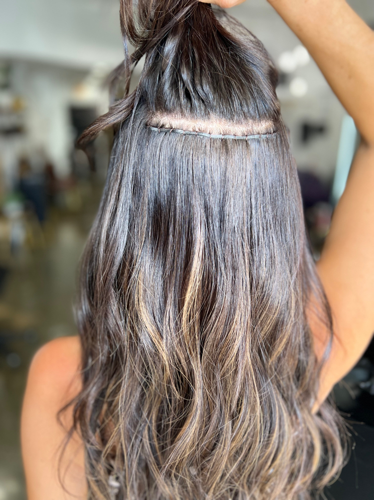 Hand Tied Move up at Ashley Mia Hair in St.Petersburg, FL