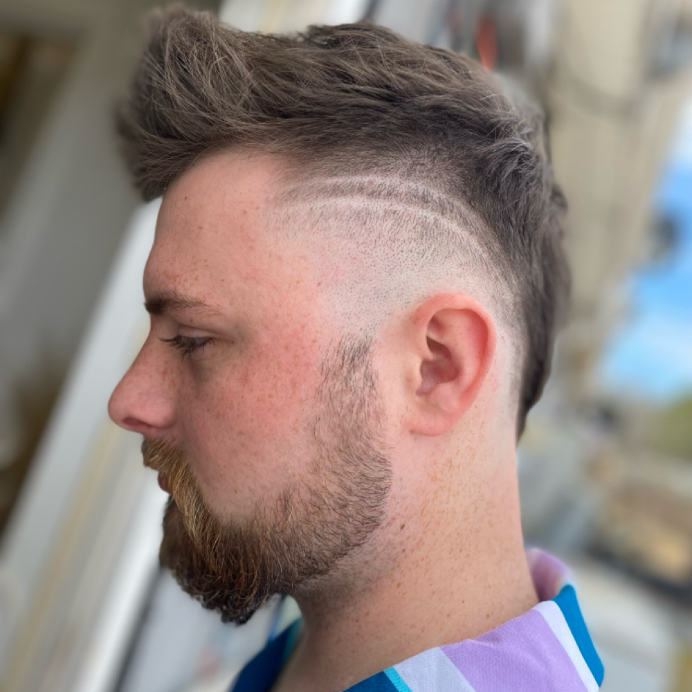 Sylist Choice Haircut at Expressions Salon & Studio in Anniston, AL