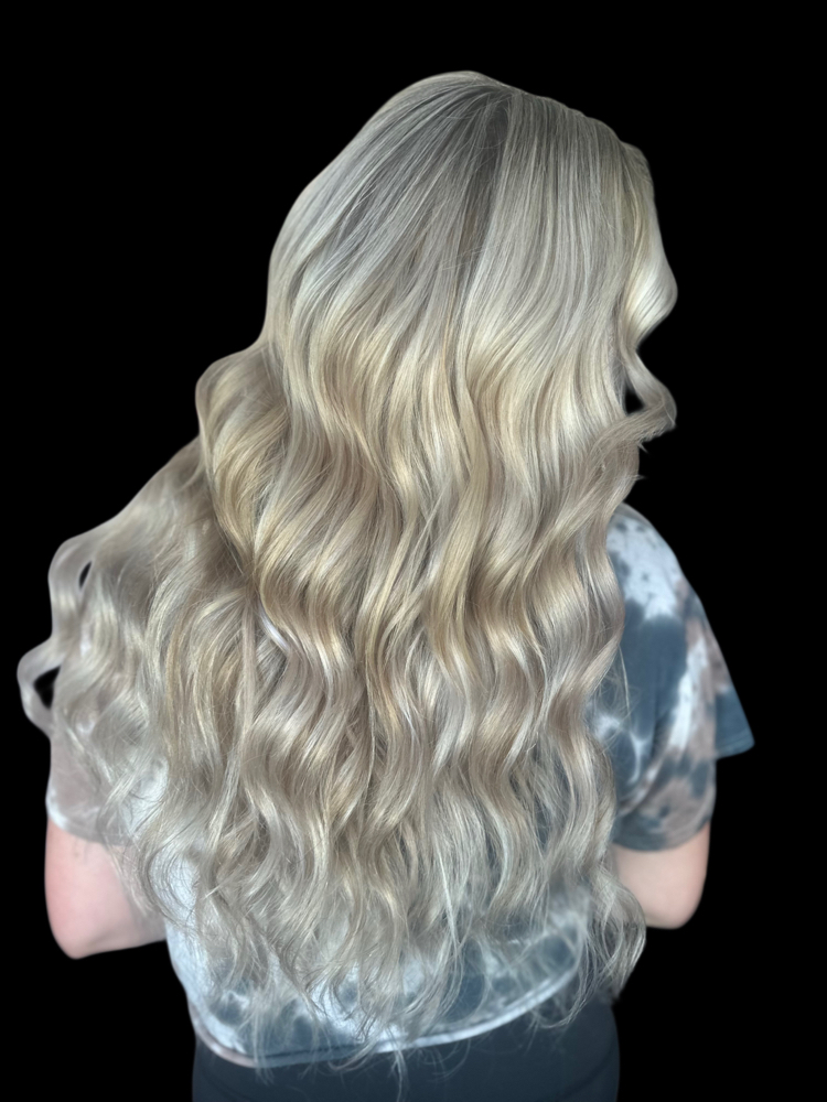 Tape-In Hair Extensions at Celestial Creations Hair & Beauty in saginaw, MI