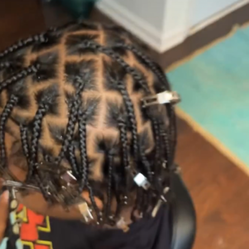 Braid Plats at Cue Hair Spa in Indianapolis, IN