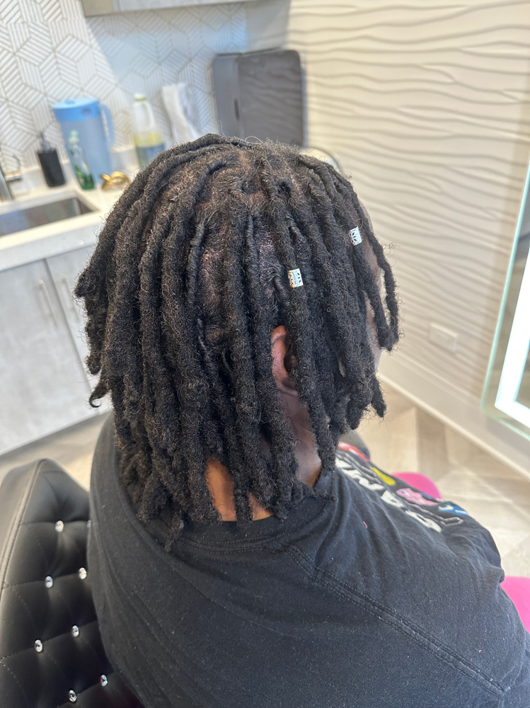 Loc Retwist (Above Shoulder Length)