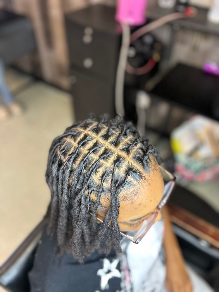 Loc retwist at Harmobeauxhair LLC in Portsmouth, VA