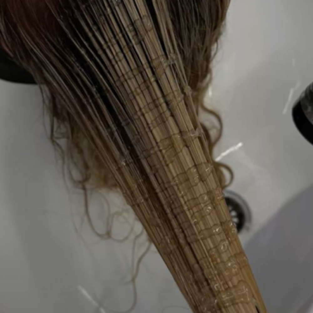 Gloss + Haircut Package at Hue Haus Hair Studio in Greenwood, IN