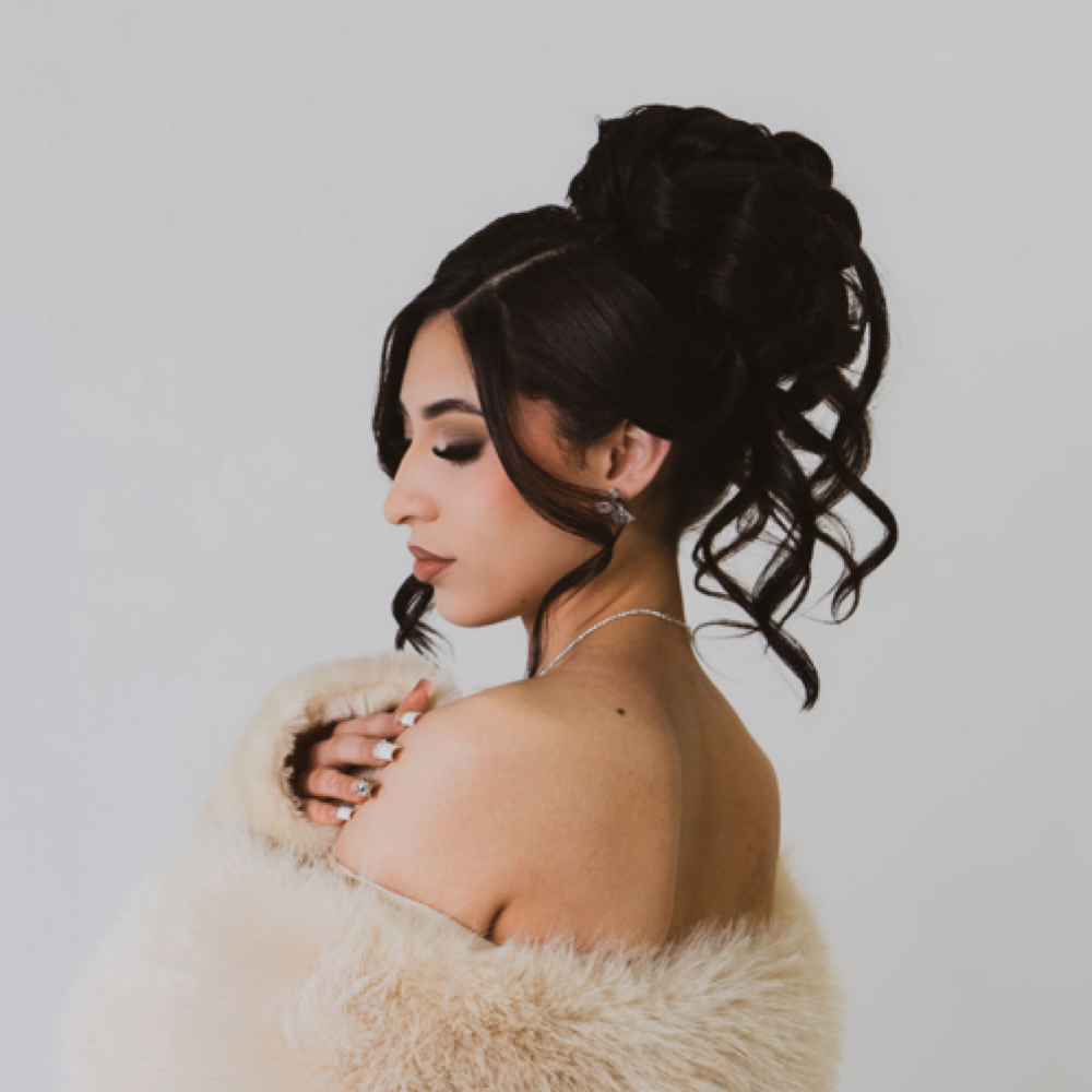 Updo Hairstyle at BeautyxSbeidy in denver, CO