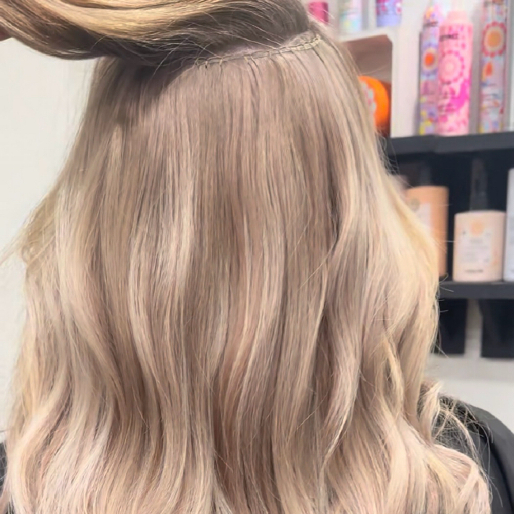 Extensions Implementation at MegaHair in Wichita, KS